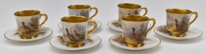 James Stinton for Royal Worcester set of six demitasse cups and saucers decorated with pheasants and