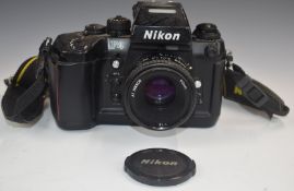 Nikon F4 35mm SLR camera, serial number US2221615 with Nikkor 50mm 1:1.8 lens