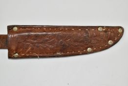 Pair of kukri knives with 29cm curved etched blades and scabbards, together with two hunting knives,