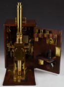 Ross London Victorian brass microscope, with screw x and y adjustment for the stage, serial number