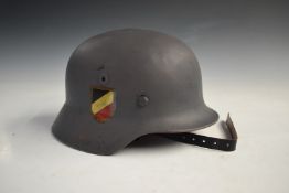 Probable WW2 manufactured German steel helmet with later lining and replacement decals, stamped ET66