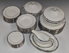 Approximately fifty two pieces of Wedgwood dinner ware decorated in the Amherst pattern including