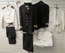 Four Royal Navy uniforms, associated rank insignia and buttons including two Mess kits and