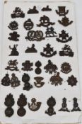 Collection of approximately thirty three officer's Service Dress collar badges including South Wales