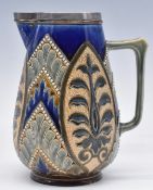 Doulton Lambeth art pottery jug with plated mount and incised El / LE and AG monograms to base,