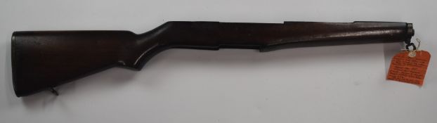 American M1 Garand bolt-action rifle stock with storage compartment to the chequered butt plate