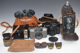 Cameras to include Rolleiflex TLR, serial number 268758, in original leather case, Yashica Electro