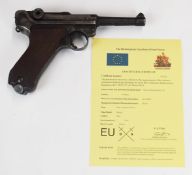 Deactivated German Luger semi-automatic pistol with chequered wooden grips, breech dated 1940,