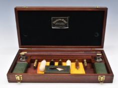 Pendleton Royal gun cleaning kit in fitted wooden case.