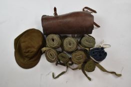 WW2 Japanese cloth cap, leather gaiters, canvas strap and eight puttees