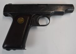 Deactivated Ortgies German 7.65mm semi-automatic pistol with monogrammed wooden grips, serial number
