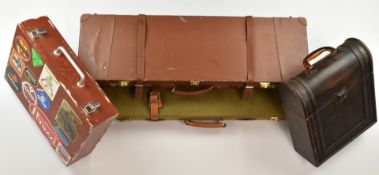 Two shotgun cases, one leather bound canvas double example (81x31x8cm) and one faux leather (