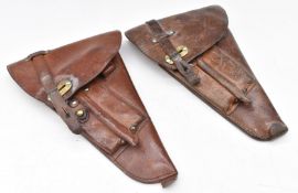 Two Swedish leather Luger or similar pistol holders with magazine compartments, brass fitting and