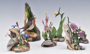 Collection of Boehm porcelain flowers and a robin, tallest 23cm