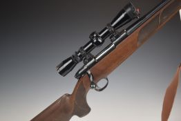 Sako III .243WIN bolt-action sporting rifle with magazine, chequered semi-pistol grip and forend,