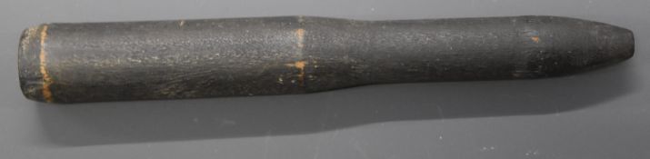 British Navy wooden training rifle round stamped 'O E D. II N W&JPT', 18cm long.