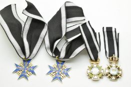Two replica Pour le Mérite medals and two replica German Vom Fels Zum Meer medals