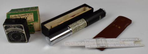 Otis King spiral slide rule in original box, slide rule and an AVO exposure meter in original box
