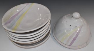 A contemporary pottery dessert set with pierced cake dome