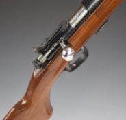 Winchester .22 bolt-action rifle with semi-pistol grip, adjustable sights, magazine and 25 inch