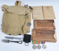 Collection of militaria including marching compass by TG & Co, two Defence medals, War Medal, two