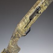 Browning Maxus 12 bore 3-shot semi-automatic shotgun with all over camouflage finish, chequered