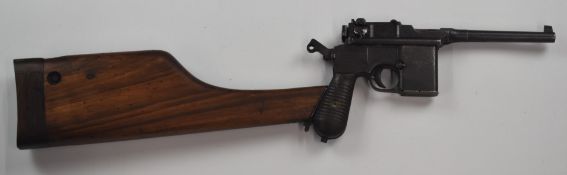 Deactivated WW1 German C96 'Broomhandle' Mauser semi-automatic pistol with wooden grips and shoulder