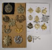 Ten Scottish regimental badges including Argyll & Sutherland Highlanders, Highland Light Infantry,