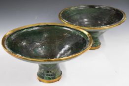 A pair of 18th/19thC Hispano Moresque green glazed pedestal bowls with metal mounts, diameter 44,
