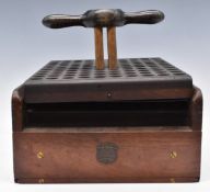 J Erskine & Co Newton Stewart patent mahogany shotgun cartridge loading machine with four legged