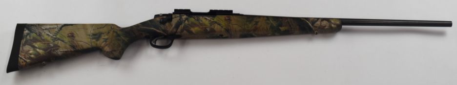 Marlin XS7 7mm-08 Remington bolt-action rifle with Realtree camouflage composite stock, chequered
