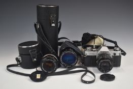 Canon AE1 35mm SLR camera with Vivitar 28mm 1:2.8, Canon 50mm 1:1.18 and a Vivitar 70-210 1:3.5