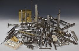 A collection of orthopaedic surgeon's instruments to include hip replacement surgery items,