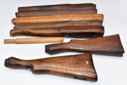 Eight Short Magazine Lee-Enfield (SMLE) or similar rifle stocks, forends and hand guards.