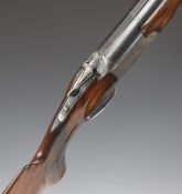 Baikal NK-12 12 bore over and under shotgun with engraved top lever, trigger guard and underside,