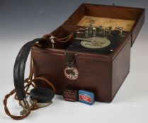 Cosmos Radiophone vintage crystal radio, housed in a mahogany box with headphones, width 22cm
