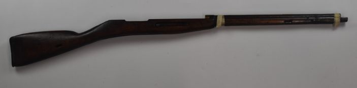 Mosin Nagant 1942 bolt-action rifle stock with steel butt plate and brass and steel mounts, 114cm