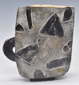 John Maltby (1936-2020) slab vase/jug with incised geometric and abstract decoration, simple loop