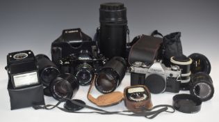 Canon camera outfit including A-1 with 50mm 1:1.8 lens, AE-1 body, 50mm 1:1.4, 35-70mm 1:3.5-4.5,