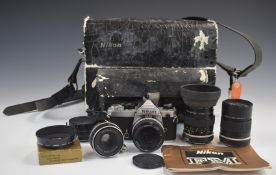 Nikon FM 35mm SLR camera outfit including 50mm 1:1.8, 55mm 1:2.8 and 135mm 1:2.8 lenses, 2x