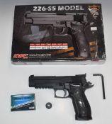 KWC 226-S5 6mm Co2 air pistol with composite grips and adjustable sights, in original box with