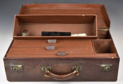 A leather surgeon's case with fitted interior of drawers, impressed with Professor R St Leger