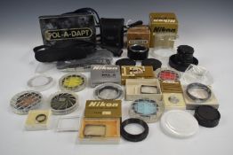 Nikon El-Nikkor 50mm f/2.8 enlarging lens in original box, Nikon Pol-a-dapt Polaroid adaptor,