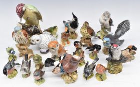 A collection of Beswick birds including woodpecker, lapwing and kestrel