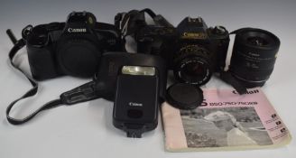Canon EOS 850 35mm SLR camera together with 35-70mm EF lens, together with a Canon T50 camera with