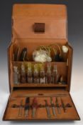 Vintage leather dentist's travelling case, the fitted interior including glass bottles and tools,
