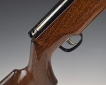 Webley Omega .177 air rifle with chequered semi-pistol grip, raised cheek piece to the stock and