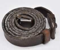 German WW2 Mauser K98 leather rifle sling stamped 'gxy 42' and 'WaA 80' under Nazi eagle.