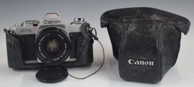 Canon AV-1 35mm SLR camera with FD 50mm 1:1.8 lens and soft case