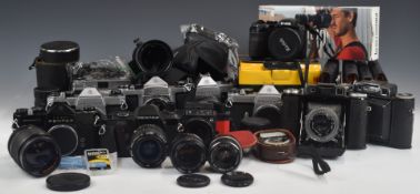 Pentax and other SLR cameras comprising three Spotmatic F, one with 1:1.8 55 lens, further